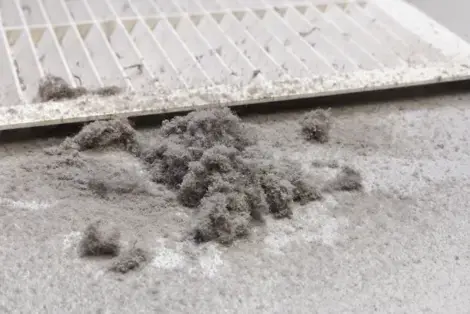 Dust from air duct next to air intake grate