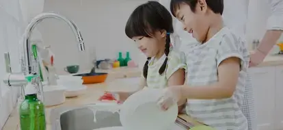 Children cleaning dishes