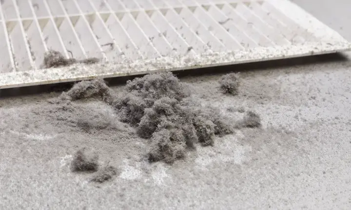 Dust from air duct next to air intake grate 