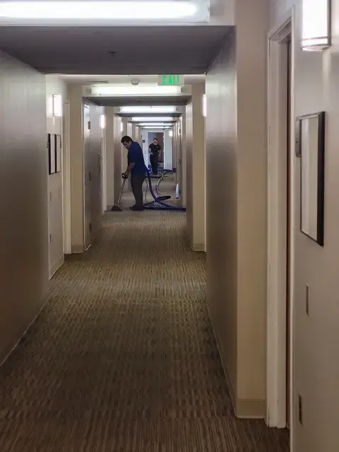 COIT Technician cleaning a UCLA Hallway